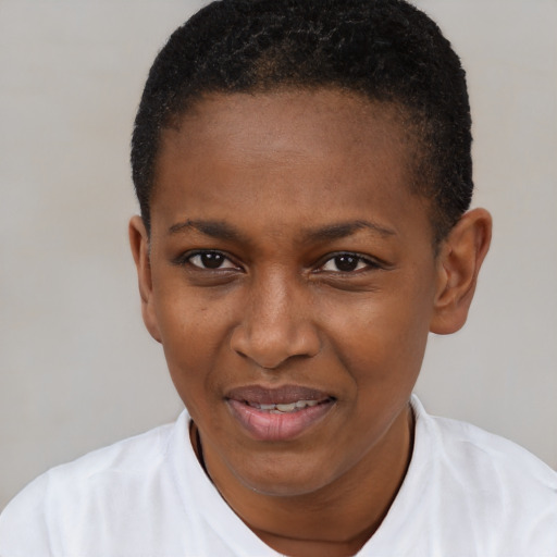 Joyful black young-adult female with short  brown hair and brown eyes