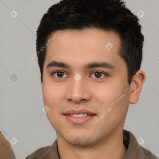 Joyful latino young-adult male with short  black hair and brown eyes