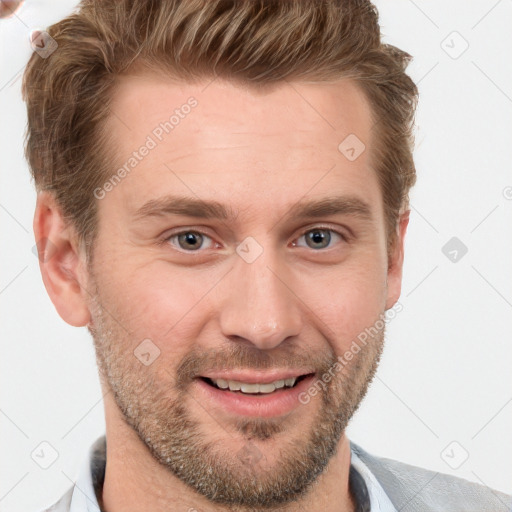 Joyful white young-adult male with short  brown hair and grey eyes