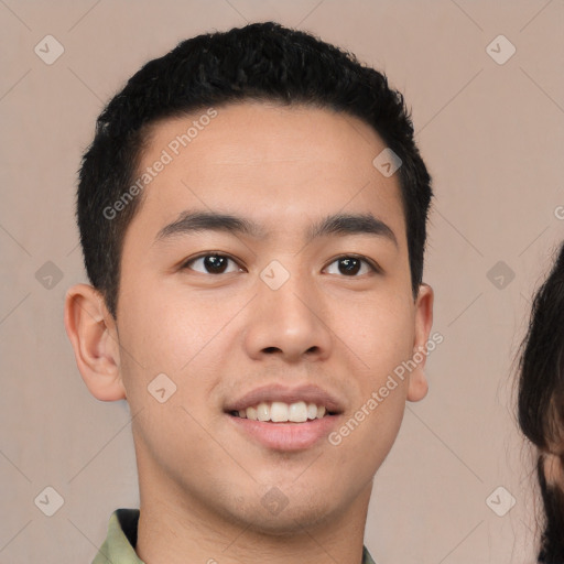 Joyful white young-adult male with short  black hair and brown eyes