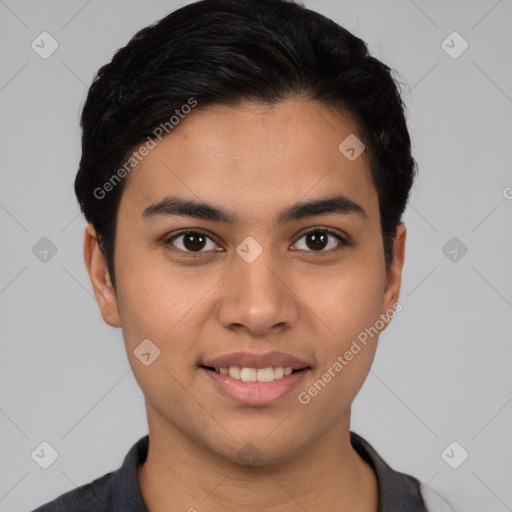 Joyful white young-adult male with short  black hair and brown eyes