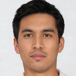 Neutral asian young-adult male with short  brown hair and brown eyes