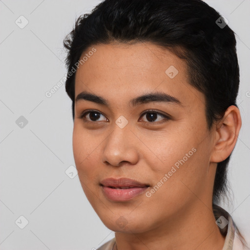 Joyful asian young-adult female with short  black hair and brown eyes