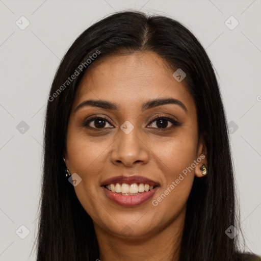 Joyful latino young-adult female with long  brown hair and brown eyes