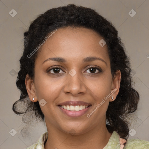 Joyful black young-adult female with medium  brown hair and brown eyes