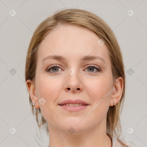 Joyful white young-adult female with medium  brown hair and blue eyes