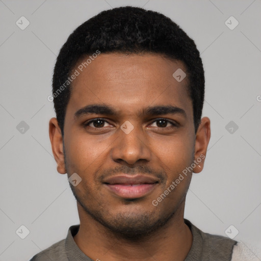 Joyful black young-adult male with short  black hair and brown eyes