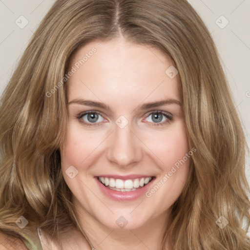 Joyful white young-adult female with medium  brown hair and green eyes