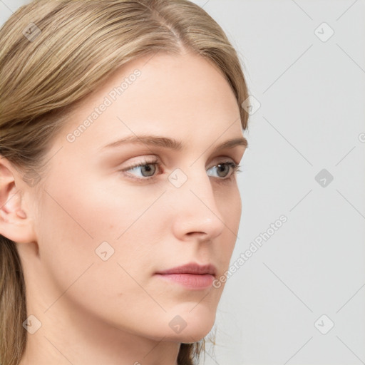 Neutral white young-adult female with long  brown hair and grey eyes