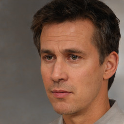 Neutral white adult male with short  brown hair and brown eyes