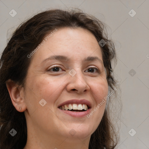 Joyful white adult female with medium  brown hair and grey eyes