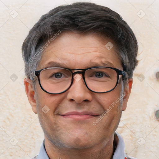 Joyful white middle-aged male with short  brown hair and brown eyes