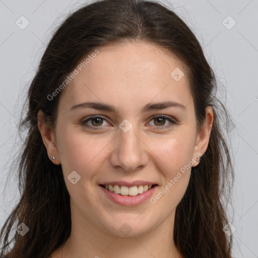 Joyful white young-adult female with long  brown hair and grey eyes