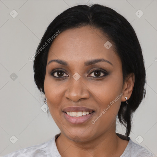 Joyful black young-adult female with medium  black hair and brown eyes