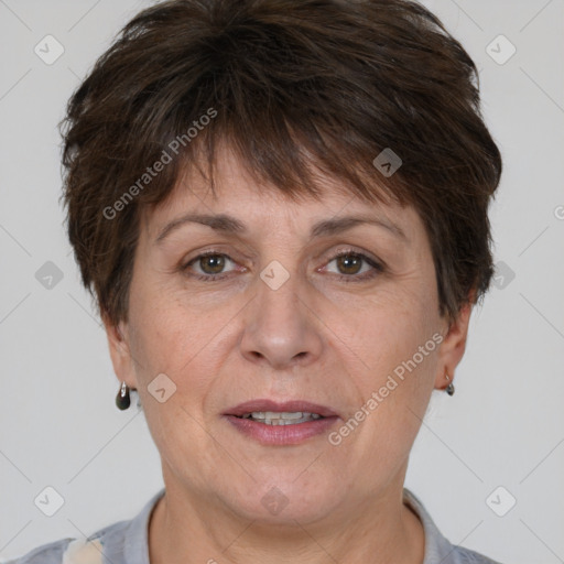 Joyful white adult female with short  brown hair and brown eyes