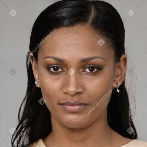 Joyful black young-adult female with medium  brown hair and brown eyes