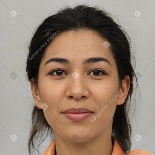 Joyful latino young-adult female with medium  brown hair and brown eyes