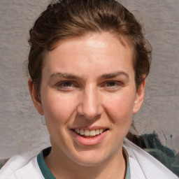 Joyful white adult female with short  brown hair and brown eyes