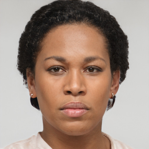 Neutral latino young-adult female with short  brown hair and brown eyes