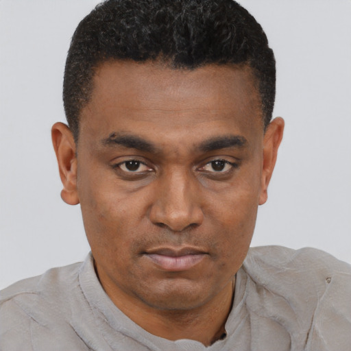 Neutral black young-adult male with short  black hair and brown eyes