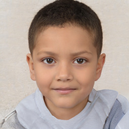 Joyful white child male with short  brown hair and brown eyes