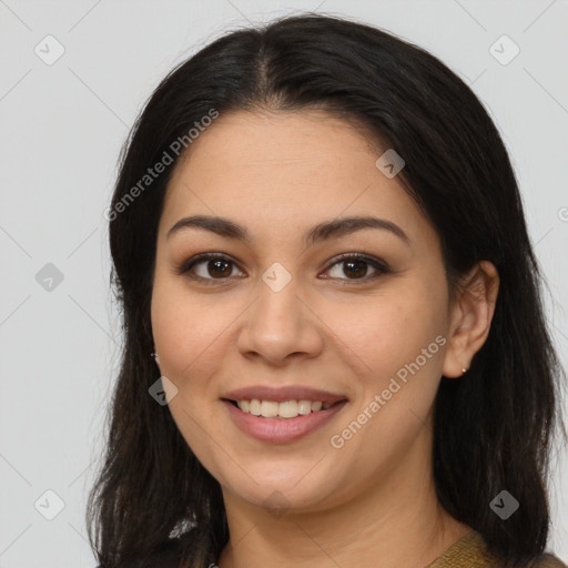 Joyful latino young-adult female with long  brown hair and brown eyes