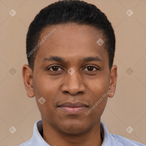 Joyful black young-adult male with short  black hair and brown eyes