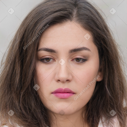 Neutral white young-adult female with long  brown hair and brown eyes