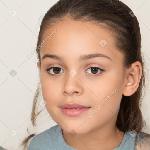 Joyful white child female with medium  brown hair and brown eyes