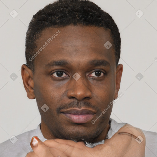 Neutral black young-adult male with short  brown hair and brown eyes