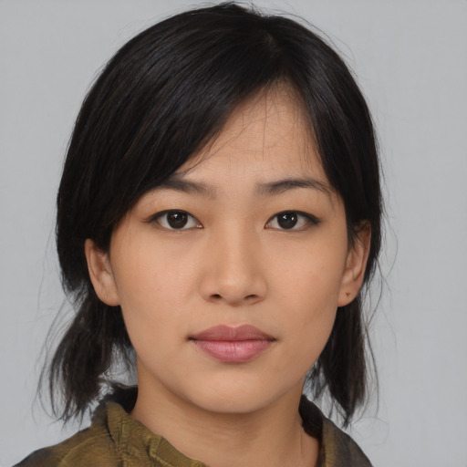 Neutral asian young-adult female with medium  black hair and brown eyes