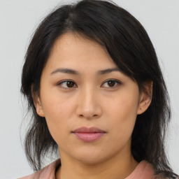 Neutral asian young-adult female with medium  brown hair and brown eyes