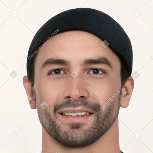 Joyful white young-adult male with short  black hair and brown eyes