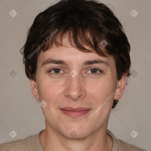 Joyful white adult male with short  brown hair and grey eyes