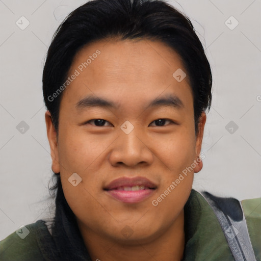 Joyful asian young-adult male with short  black hair and brown eyes