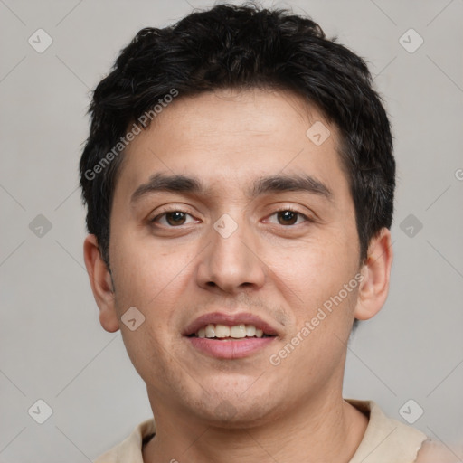 Joyful white young-adult male with short  black hair and brown eyes