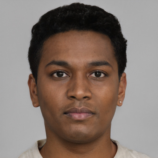 Neutral black young-adult male with short  black hair and brown eyes