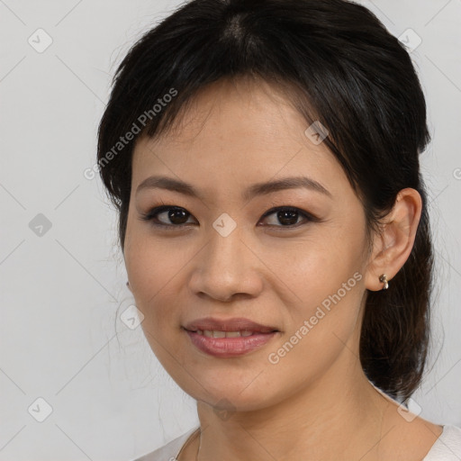 Joyful asian young-adult female with medium  brown hair and brown eyes