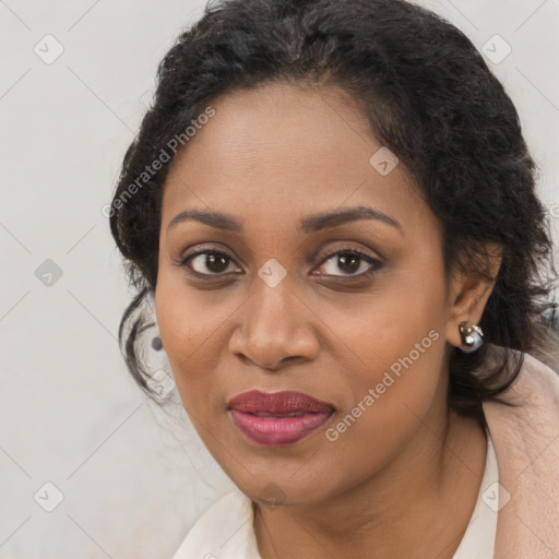 Joyful black young-adult female with medium  brown hair and brown eyes