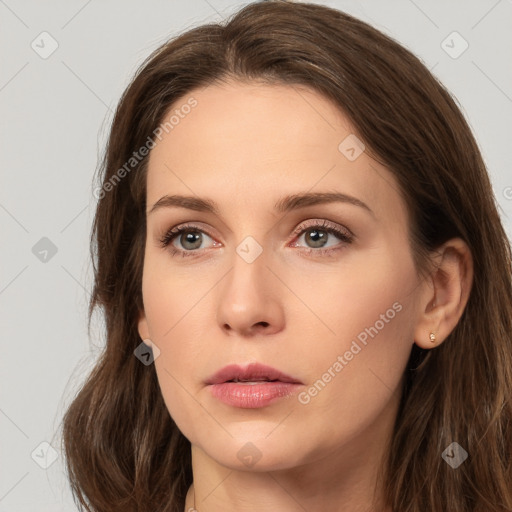 Neutral white young-adult female with long  brown hair and brown eyes