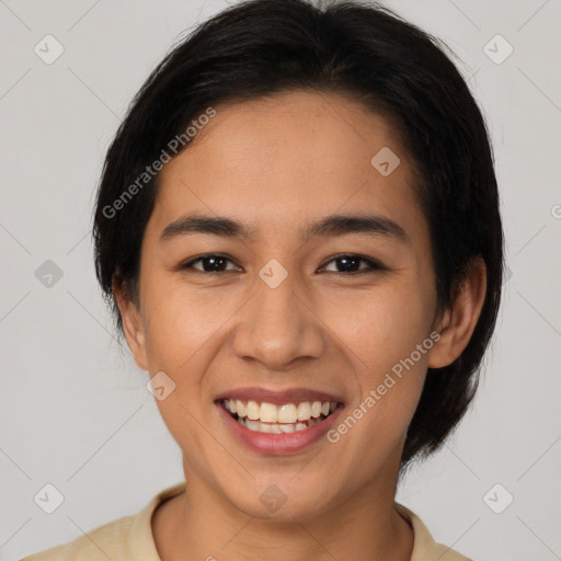 Joyful latino young-adult female with medium  brown hair and brown eyes