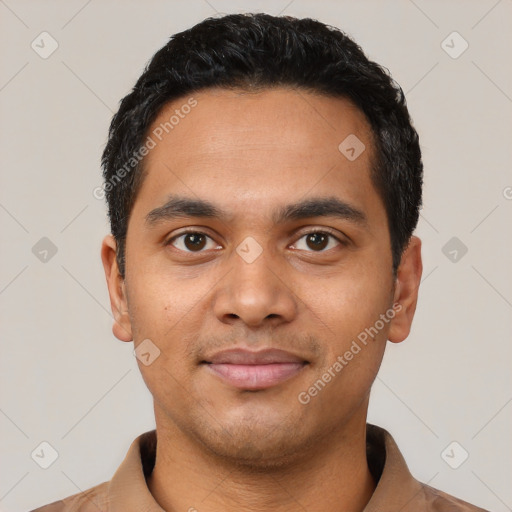 Joyful latino young-adult male with short  black hair and brown eyes