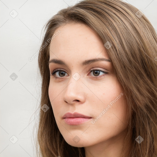 Neutral white young-adult female with long  brown hair and brown eyes