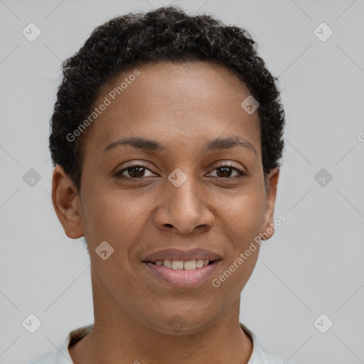 Joyful black young-adult female with short  brown hair and brown eyes