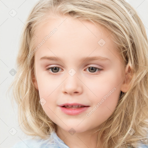 Joyful white child female with medium  brown hair and blue eyes