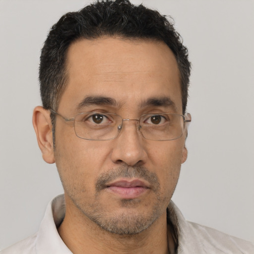 Neutral white adult male with short  brown hair and brown eyes