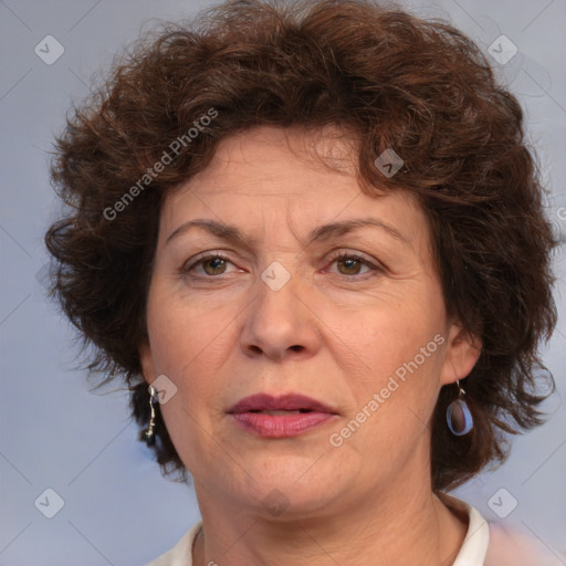 Joyful white middle-aged female with medium  brown hair and brown eyes