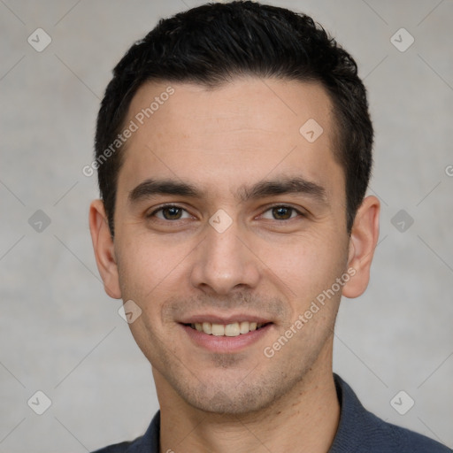 Joyful white young-adult male with short  black hair and brown eyes