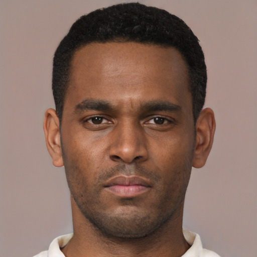 Neutral black young-adult male with short  black hair and brown eyes