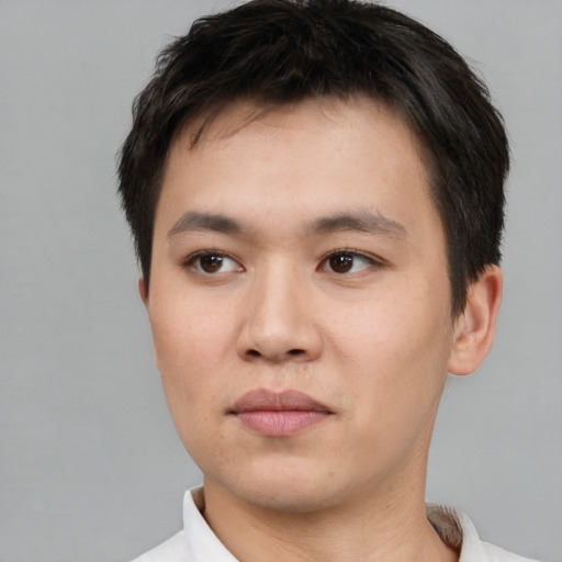 Neutral white young-adult male with short  black hair and brown eyes